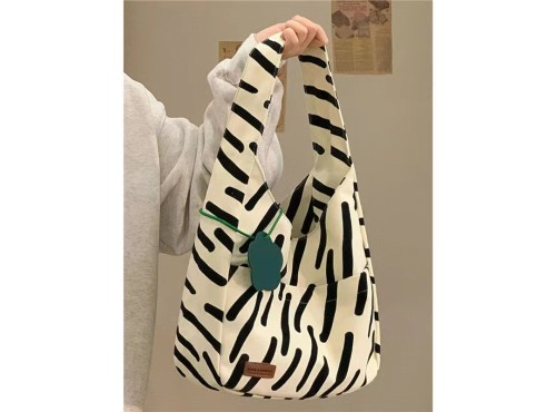 Niche high-quality zebra pattern canvas bag female 2022 new large-capacity tote bag student class shoulder bag Niche high-quality z...